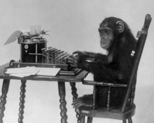 Chimp sat at a typewriter